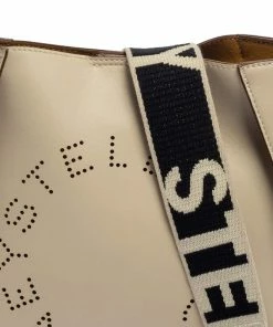 Cheapest ⌛ Stella McCartney Cream Faux Leather Perforated Logo Messenger Bag For 👩 Women 🛒 -Stella McCartney Shop luxury women stella mccartney used handbags p386626 004