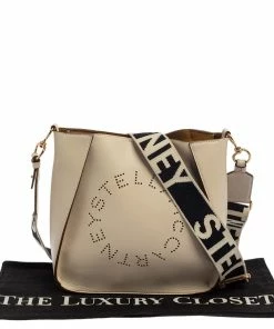 Cheapest ⌛ Stella McCartney Cream Faux Leather Perforated Logo Messenger Bag For 👩 Women 🛒 -Stella McCartney Shop luxury women stella mccartney used handbags p386626 007