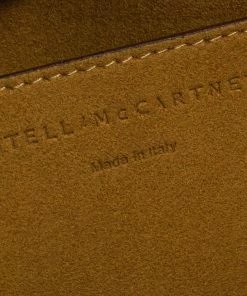 Cheapest ⌛ Stella McCartney Cream Faux Leather Perforated Logo Messenger Bag For 👩 Women 🛒 -Stella McCartney Shop luxury women stella mccartney used handbags p386626 008