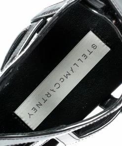 Coupon ✨ Stella McCartney Metallic Dull Silver Cut Out Faux Leather Hackney Printed Wedge Platform 🩴 Sandals Size 37 For 👩 Women 🥰 -Stella McCartney Shop luxury women stella mccartney used shoes p186359 002