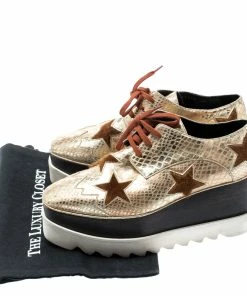 Budget ⌛ Stella McCartney Metallic Gold Python Effect Faux Leather And Faux Fur Elyse Star Platform Derby Size 38 For 👩 Women 💯 -Stella McCartney Shop luxury women stella mccartney used shoes p193835 008