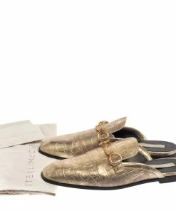 Deals ⭐ Stella McCartney Gold Faux Croc Embossed Leather Flat Mules Size 38.5 For 👩 Women ✨ 17 Deals ⭐ Stella McCartney Gold Faux Croc Embossed Leather Flat Mules Size 38.5 For 👩 Women ✨ -Stella McCartney Shop luxury women stella mccartney used shoes p381560 008