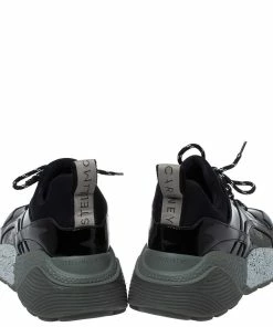 Coupon 🌟 Stella McCartney Black Faux Patent Leather And Fabric Scuba 👟 Sneakers Size 41 For 👩 Women ⭐ -Stella McCartney Shop luxury women stella mccartney used shoes p396943 001