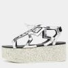 Cheap ๐คฉ Stella McCartney Metallic Silver Cut Out Faux Leather Hackney Printed Wedge Platform ๐ฉด Sandals Size 37 For ๐ฉ Women ๐ 2 Cheap ๐คฉ Stella McCartney Metallic Silver Cut Out Faux Leather Hackney Printed Wedge Platform ๐ฉด Sandals Size 37 For ๐ฉ Women ๐ -Stella McCartney Shop luxury women stella mccartney used shoes p669402 001